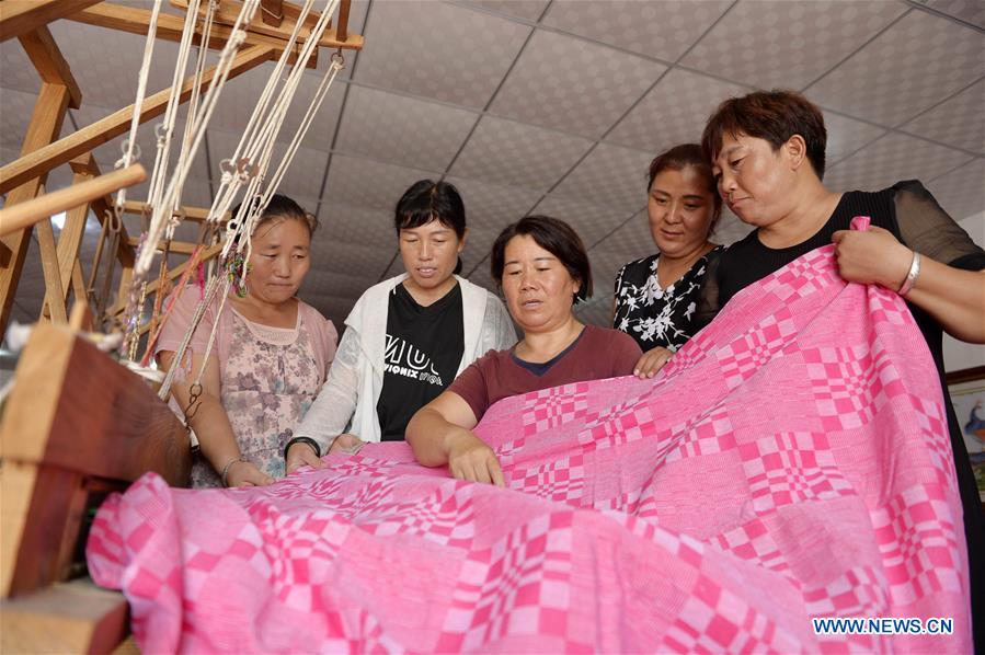 # CHINA-HEBEI-CLOTH WEAVING (CN)