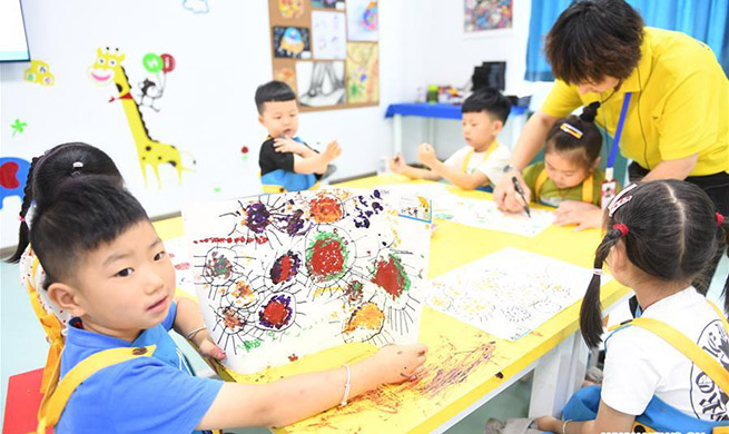 Free summer camps provided in Zhejiang for migrant, rural left-behind, impoverished children