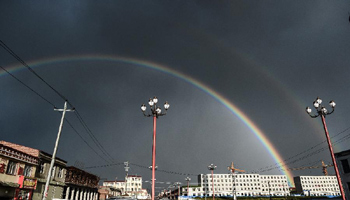 Double rainbow spotted over sky above Gangcha County, NW China